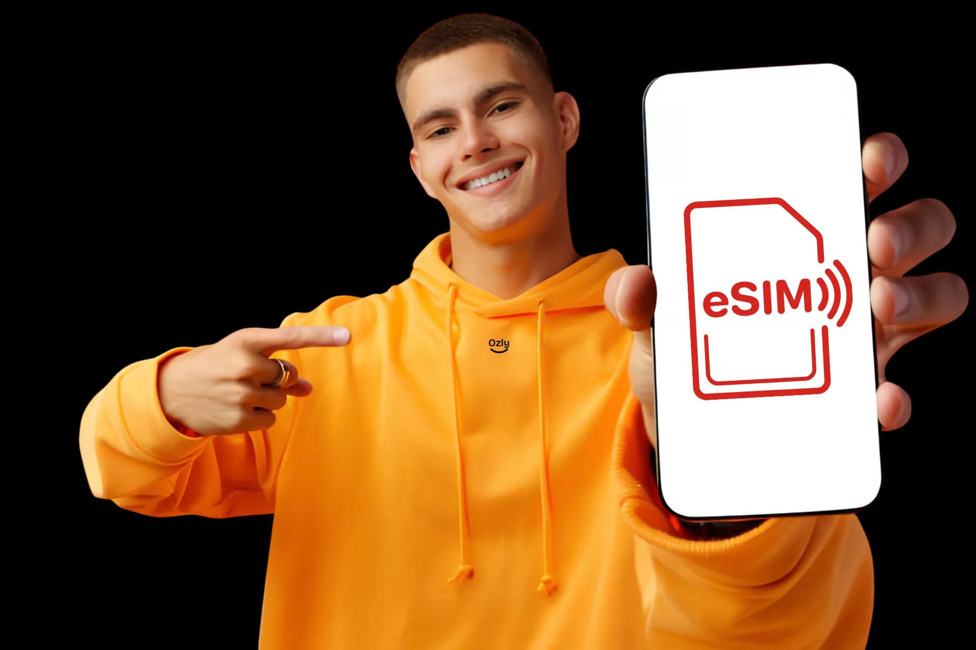 Man holding a phone showing the eSIM logo