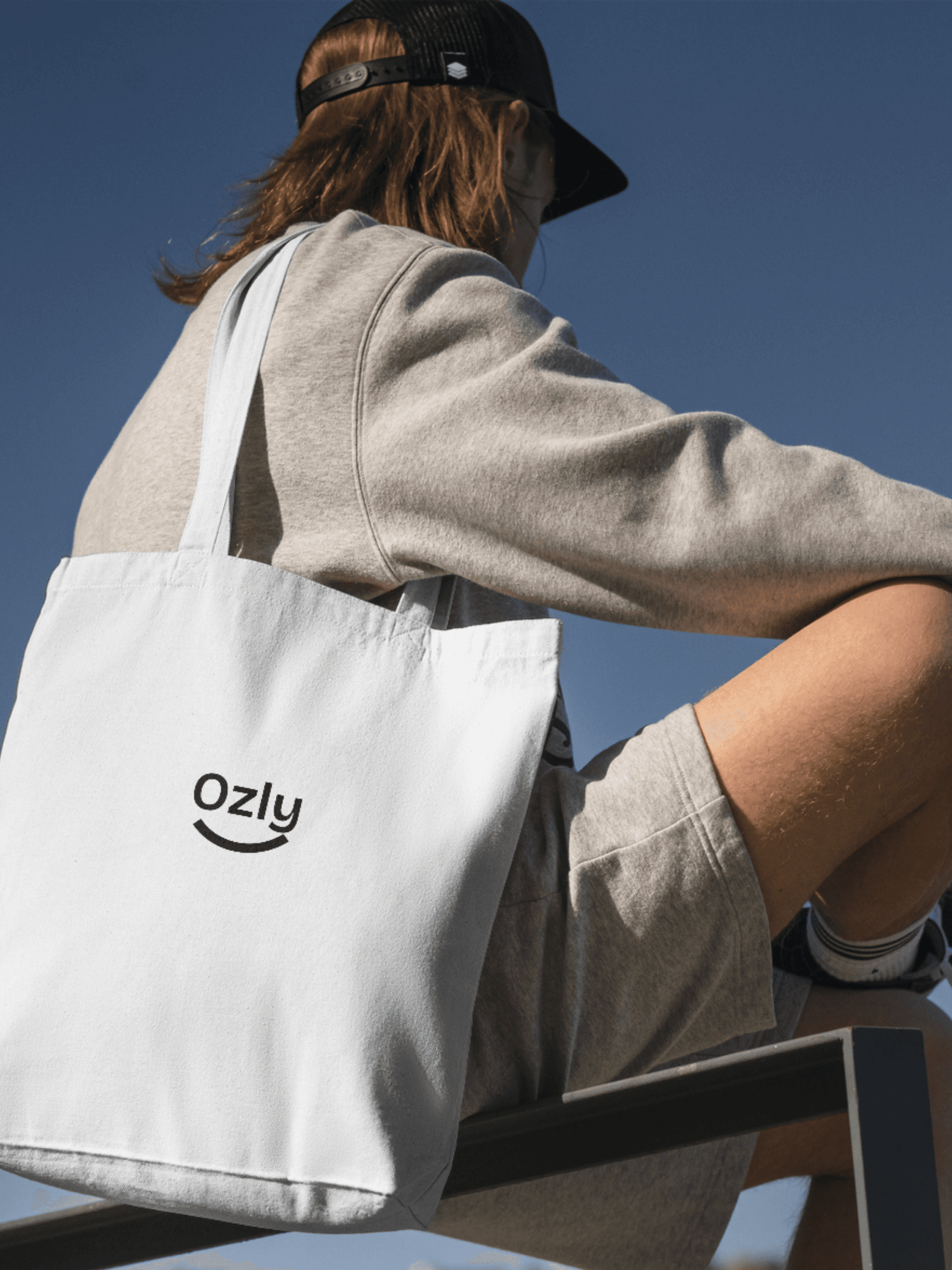 Traveler with Ozly tote bag
