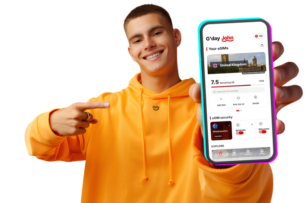 Ozly traveller showing the Ozly eSIM app on his phone